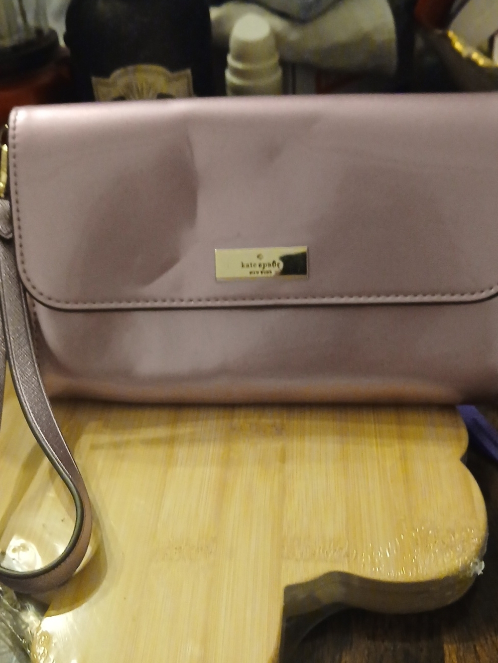 kate spade blush mauve wristlet clutch with gold plaque